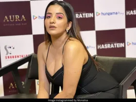 Monalisa in black bodycon dress