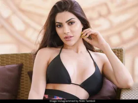 Nikki Tamboli in black bikini