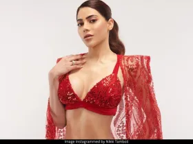 Nikki Tamboli in red outfit