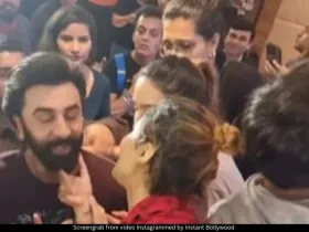 Fan tries to touch Ranbir Kapoor's face.